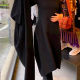 Clara - Robe midi noire avec poches