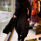 Clara - Robe midi noire avec poches