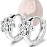 Petites boucles d'oreilles en forme de patte – Boucles pour femmes avec design animal