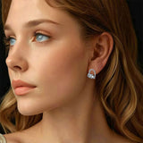 Boucles d'oreilles en argent massif représentant un chiot endormi