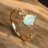 Bague artisanale avec pierre précieuse Opale d'or