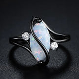 Bague rétro avec opale noire torsadée