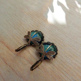 Boucles d'oreilles en forme de sphère en or vieilli
