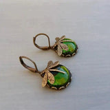 Boucles d'oreilles en forme de sphère en or vieilli