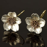 Boucles d'oreilles rétro en argent et or avec des fleurs