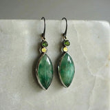 Boucles d'oreilles vintage avec pierre verte
