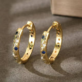 Boucles d'oreilles vintage en or avec un éclat intense