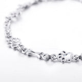 Bracelet avec Pattes de Chien Suspendues et Os en Argent Brut, Édition Limitée