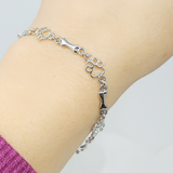 Bracelet avec Pattes de Chien Suspendues et Os en Argent Brut, Édition Limitée