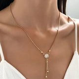 Collier avec pendentif vintage doré