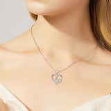 Collier en argent avec patte et cœur en zirconium