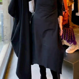 Clara - Robe midi noire avec poches